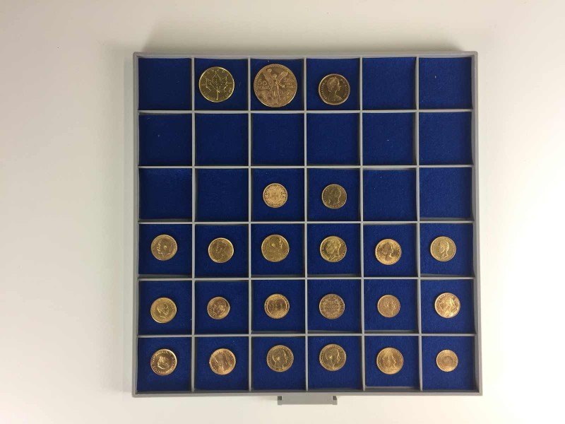 24 Goldmünzen alle Welt. Dabei u.a. 2 x 20 Franken Vreneli, 2 x 20 Mark Preussen...