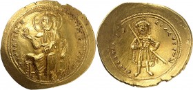ISAAC I COMMENE (1057-1059). Histamenon nomisma (4,37 g).
A/ + IhS XIS RЄX-RЄϚNANTIhm. Le Christ assis de face sur un trône, levant la main droite en...