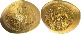 CONSTANTIN X DUCAS (1059-1067). Histamenon nomisma
(4,38 g).
A/ +IhS IXS RЄX-RЄϚNANTIhm. Le Christ assis sur un trône à dossier carré, croix nimbée ...