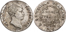 PREMIER EMPIRE (1804-1814) NAPOLEON 1er. 1/2 Franc 1806 Q = Perpignan (15 359 ex.).
A/ NAPOLEON EMPEREUR. Sa tête nue à droite.
R/ RÉPUBLIQUE FRANÇA...