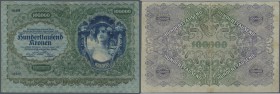 Austria / Österreich
100.000 Kronen 1922 P. 81, used with strong vertical and horizontal fold, center hole, minor border tears (one of them 0,5cm tap...