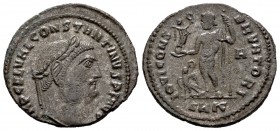 Constantino I. Follis. 316-317 d.C. Cyzicus. (Spink-15946). (Ric-5). Rev.: IOVI CONSERVATORI, en exergo SNK. Júpiter en pie a izquierda con Victoria s...