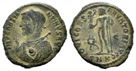Constantino II. Follis. 313 d.C. Cyzicus. (Spink-15932). (Ric-108). Rev.: IOVI CONSERVATORI. Júpiter en pie a izquierda con globo, Victoria y cetro, a...