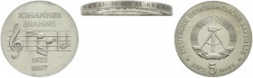 Gedenkmünzen der DDR
5 Mark Brahms 1972. Mit doppelter Randschrift, 1 X normal, 1 X kopfstehend gegenläufig. Im Jaeger ist nur die doppelte Randschri...