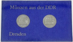Gedenkmünzen der DDR
Themensatz Dresden mit 5 Mark 1985 Zwinger und Frauenkirche in Hartplastik mit blauem Inlett. Original VEB. Stempelglanz