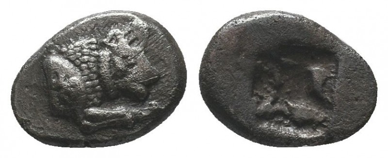 CARIA, Uncertain. Circa 500 BC. AR Sixth Stater. Forepart of lion right, symbol ...