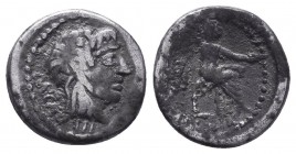 M. Cato 89 BC. Rome AR . [M·CATO], Ivy-wreathed head of Liber right / Victory seated right, holding patera in right hand and palm branch in left; in e...