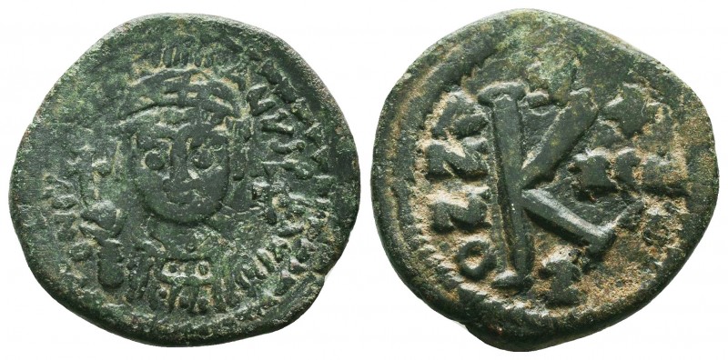 Justinian I, AE Half-Follis. Antioch. DN IVSTINIANVS PP AVG, helmeted, cuirassed...