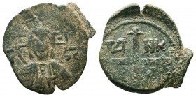 CRUSADERS. Tancred Principality of Antioch, 1104-1112 AD. AE Follis Fourth type. Nimbate bust of Christ. Reverse: Cross pommetée above floral sprays f...