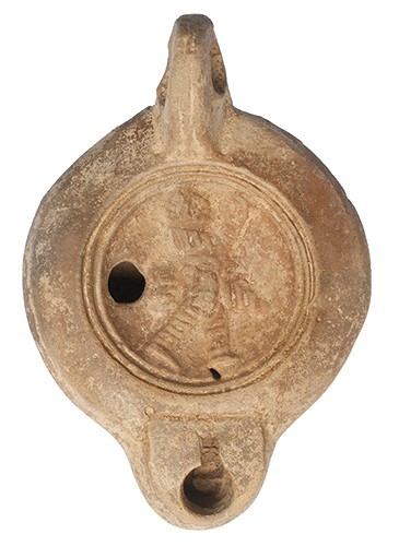 ROMA. Imperio Romano. Lucerna (II-III d.C.). Terracota. Figura masculina coronad...