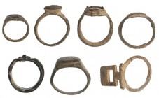 ROMA y BIZANCIO. Lote de siete anillos (III-IX d.C.). Bronce y pasta vítrea. Diámetro 14,0-21,0 mm.
