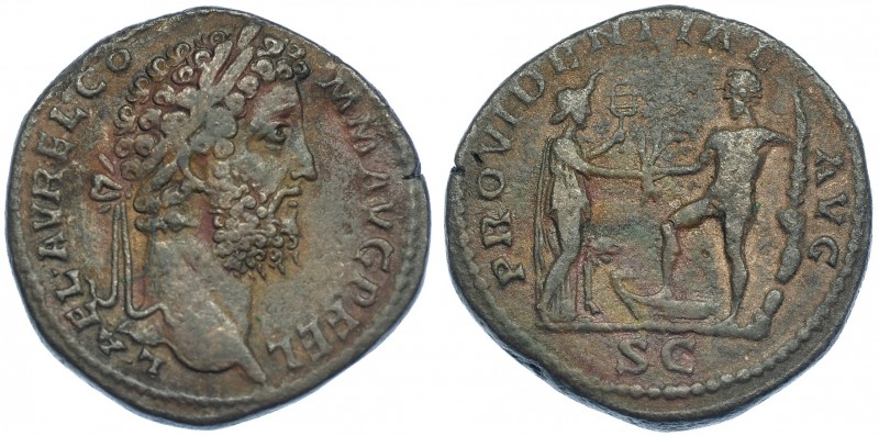 CÓMODO. Sestercio. Roma (192). R/ Hércules con pie sobre proa saludando a África...