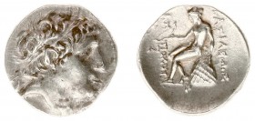 The Seleukid Kingdom - Antiochos I Soter (281-261 BC) - AR Drachm (Magnesia, 4.27 g) - Diademed head right / Apollo seated left on omphalos, holding b...