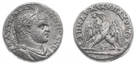 Caracalla (196-217) - Phoenicia / Tyre - AR Tetradrachm (AD 215-217, 12.42 g) - Laureate, draped, and cuirassed bust right / Eagle standing facing on ...