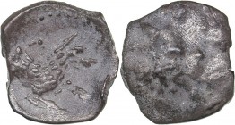 Lykaonia, Laranda AR obol Ca. 324-323 B.C.
0.60 g. 11mm. F/XF Baaltars seated left, holding grain ear, grape bunch, and sceptre; all within circular ...