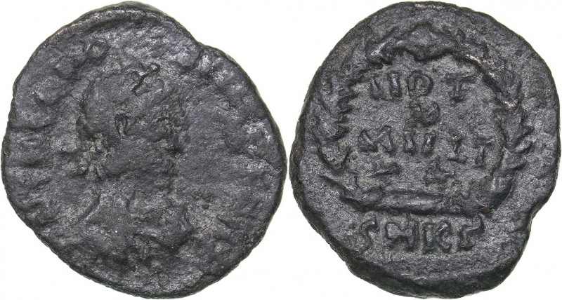 Roman Empire Æ follis - Theodosius I 379-395 AD
1.17 g. 14mm. F/F VOT/X/MVLT/X/...