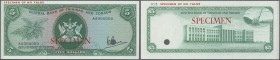 Trinidad & Tobago
5 Dollars ND(1977) Specimen P. 31s, zero serial numbers and specimen overprint, cancellation hole, trace of attachment at left bord...
