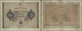 Turkey / Türkei
200 Piastres 1867 P. 55b, strong center fold which causes tears in paper along the fold, writing on border, one tear fixed with small...