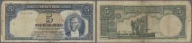 Turkey / Türkei
5 Lira ND(1937) P. 127, strong center fold, staining in paper, borders worn causing border tears, no holes, still nice colors, condit...