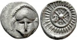 THRACE. Mesambria. Obol (Circa 4th century BC). 

Obv: Facing Corinthian helmet.
Rev: META. 
Four spoked wheel.

SNG Stancomb 218; cf. SNG BM Bl...