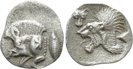 MYSIA. Kyzikos. Hemiobol (Circa 450-400 BC). 

Obv: Forepart of boar left; retrograde K on shoulder; to right, tunny upward.
Rev: Head of lion left...