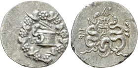 MYSIA. Pergamon. Cistophor (Circa 166-67 BC). Ar-, prytanis. 

Obv: Cista mystica with serpent; all within ivy wreath.
Rev: Bowcase between two ser...