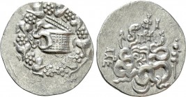 MYSIA. Pergamon. Cistophor (Circa 133-67 BC). 

Obv: Cista mystica with serpent; all within ivy wreath.
Rev: Bowcase between two serpents; monogram...