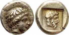 LESBOS. Mytilene. EL Hekte (Circa 454-428/7 BC). 

Obv: Diademed head of youthful male right.
Rev: Bearded male head right within linear square; al...