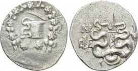 IONIA. Ephesos. Cistophor (Circa 133-67 BC). Dated CY 52 (83/82 BC). 

Obv: Cista mystica with serpent; all within ivy wreath.
Rev: Bowcase between...