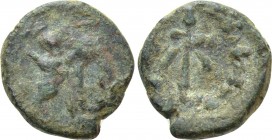 IONIA. Herakleia ad Latmon. Ae (Circa 190-100 BC). 

Obv: Nike advancing left, trophy over her shoulder; monogram in left field; everything within w...