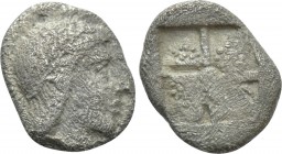 IONIA. Kolophon. Hemiobol (Circa 450-410 BC). 

Obv: Laureate head of Artemis right.
Rev: Quadripartite incuse square; pellet in centre; fields gra...