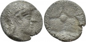 IONIA. Kolophon. Hemiobol (Circa 450-410 BC). 

Obv: Laureate head of Artemis right.
Rev: Quadripartite incuse square; pellet in centre.

Milne, ...