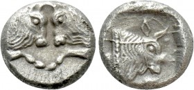 CARIA. Uncertain. Obol (5th century BC). 

Obv: Confronted foreparts of two bulls.
Rev: Forepart of bull left within incuse square.

Cf. SNG Kayh...