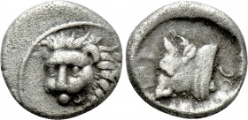 CARIA. Uncertain. Obol (Circa 400-340 BC). 

Obv: Head of lion left.
Rev: Head of bull left; symbol behind.

SNG Kayhan 990 var. (no symbo)l; SNG...