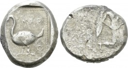 CILICIA. Mallos. Stater (Circa 440-390 BC). 

Obv: Winged male figure advancing right, holding solar disk.
Rev: ΜΑP. 
Swan standing left; to left,...