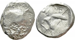 CILICIA. Tarsos. Stater or Shekel (Circa 410-385 BC). 

Obv: Rough surface.
Rev: Hoplite kneeling right, holding shield and spear; all within dotte...