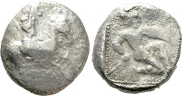 CILICIA. Tarsos. Stater or Shekel (Circa 410-385 BC). 

Obv: Warrior on horse rearing right.
Rev: Hoplite kneeling right, holding shield and spear;...