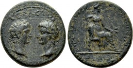 MYSIA. Pergamum. Tiberius with Augustus and Livia (14-37). Ae. Poppaeus, proconsul, and Menogenes, magistrate. 

Obv: ΣEBAΣTOI / EΠI ΠOΠΠAIOY. 
Lau...