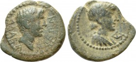 CARIA. Alabanda. Augustus ? (27 BC-14 AD). Ae. 

Obv: ΑΛΑΒΑΝΔΕΩΝ. 
Bare head right.
Rev: Bust of Apollo ot Artemis; monogram before.

RPC 2810 (...