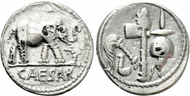 JULIUS CAESAR. Fourrée Denarius (49 BC). Military mint traveling with Caesar. 

Obv: CAESAR. 
Elephant advancing right, trampling upon horned serpe...