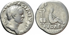 VESPASIAN (69-79). Denarius. Rome. "Judaea Capta" issue. 

Obv: IMP CAESAR VESPASIANVS AVG. 
Laureate head right.
Rev: IVDAEA. 
Judaea seated rig...