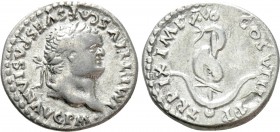 TITUS (79-81). Denarius. Rome. 

Obv: IMP TITVS CAES VESPASIAN AVG P M. 
Laureate head right.
Rev: TR P IX IMP XV COS VIII P P. 
Dolphin coiled a...