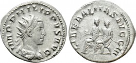 PHILIP II (247-249). Antoninianus. Rome. 

Obv: IMP PHILIPPVS AVG. 
Radiate, draped and cuirassed bust right.
Rev: LIBERALITAS AVGG III. 
Philip ...