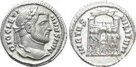 DIOCLETIAN (284-305). Argenteus. Siscia. 

Obv: DIOCLETIANVS AVG. 
Laureate head right.
Rev: VIRTVS MILITVM. 
The Tetrarchs sacrificing over trip...