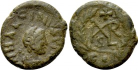 MARCIAN (450-457). Nummus. Constantinople. 

Obv: D N MARCIANVS P F AVG. 
Diademed, draped and cuirassed bust right.
Rev: Marcian monogram; cross ...