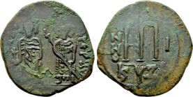 PHOCAS (602-610). Follis. Cyzicus. Dated RY 1 (602/3). 

Obv: Phocas, holding globus cruciger, and Leontia, holding cruciform sceptre, standing faci...