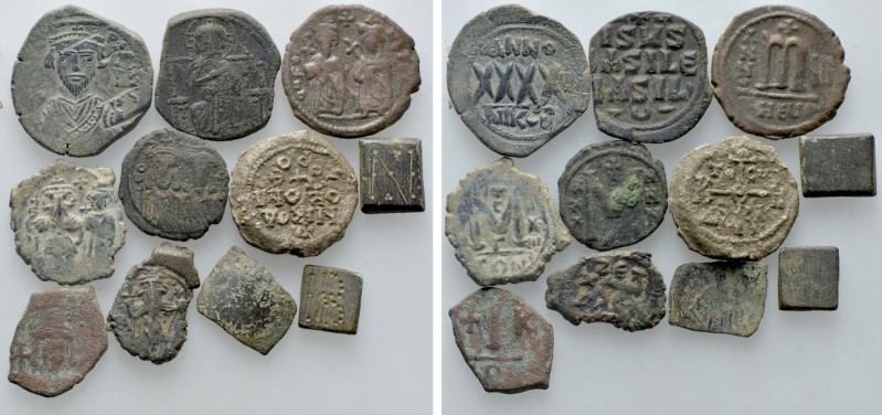 11 Byzantine Coins, Weigts and Seals. 

Obv: .
Rev: .

. 

Condition: See...