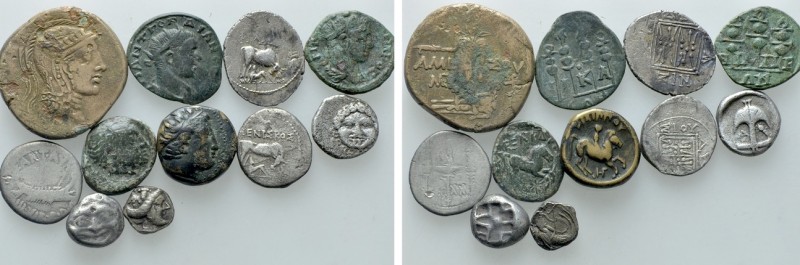 11 Greek and Roman Coins. 

Obv: .
Rev: .

. 

Condition: See picture.
...