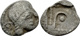 IONIA. Magnesia ad Maeandrum. Themistokles (Circa 465-459 BC). Hemiobol. 

Obv: ΘE. 
Bearded head of Hephaistos right, wearing laureate pilos.
Rev...