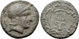 IONIA. Magnesia ad Maeandrum. Obol (Circa 400-350 BC). 

Obv: Helmeted head of Athena right.
Rev: M - A. 
Trident within circular maeander pattern...